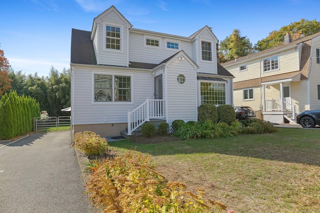 view of front of home with a front lawn