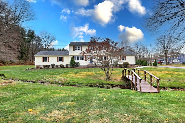 view of front of property with a front lawn