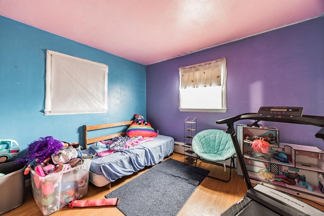 bedroom featuring hardwood / wood-style flooring