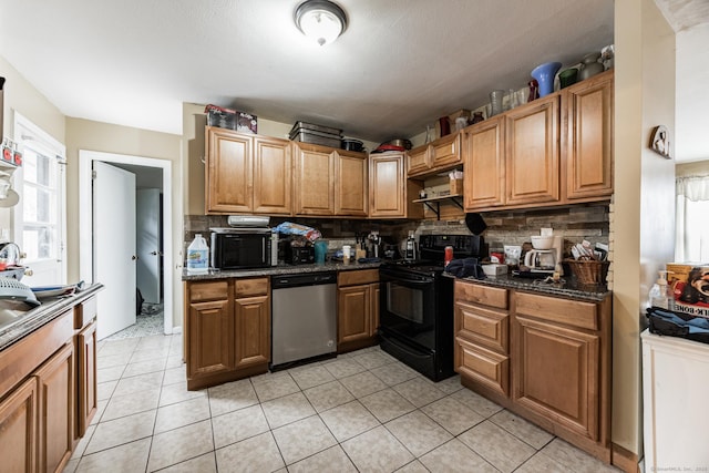 kitchen with dishwasher, black electric range oven, backsplash, and dark stone counters