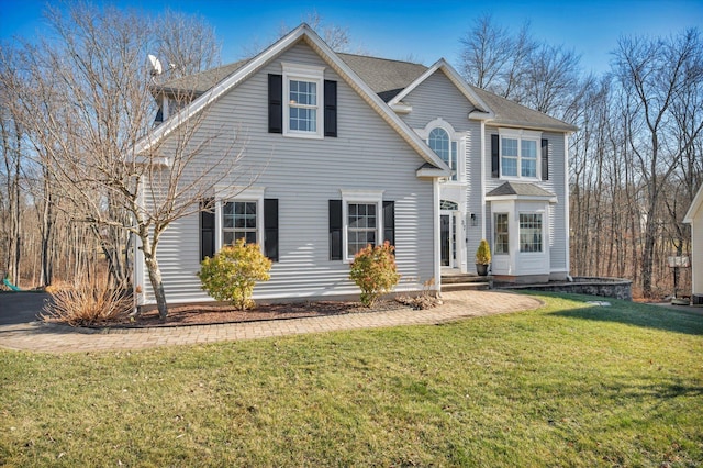 view of front facade with a front yard