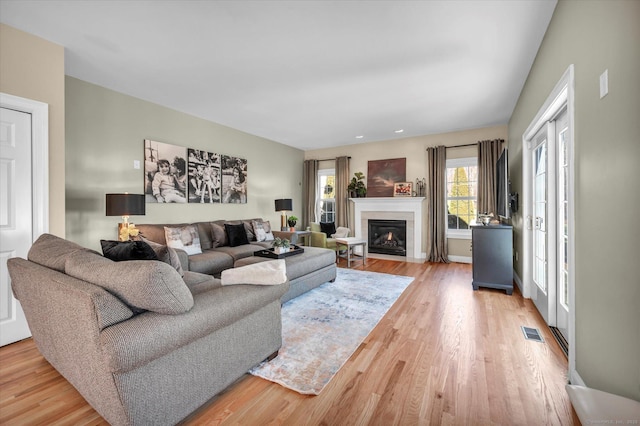 living room featuring light wood-type flooring