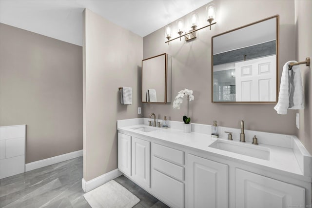 bathroom featuring vanity and a shower