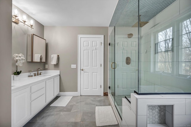 bathroom featuring vanity and walk in shower