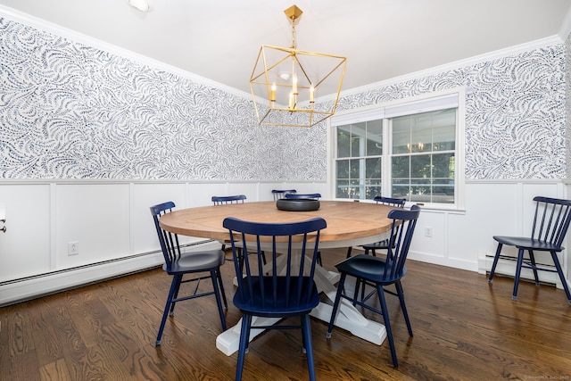 dining room featuring dark wood-type flooring, ornamental molding, baseboard heating, and a notable chandelier