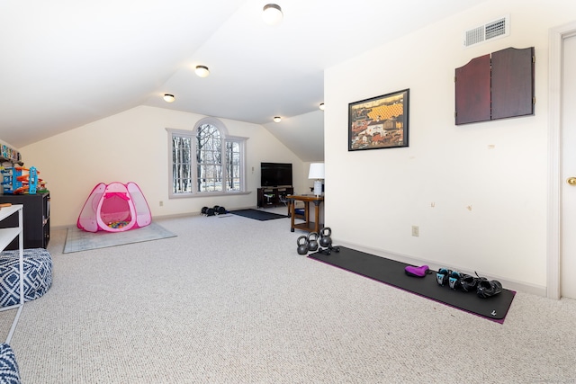 interior space featuring lofted ceiling and carpet flooring