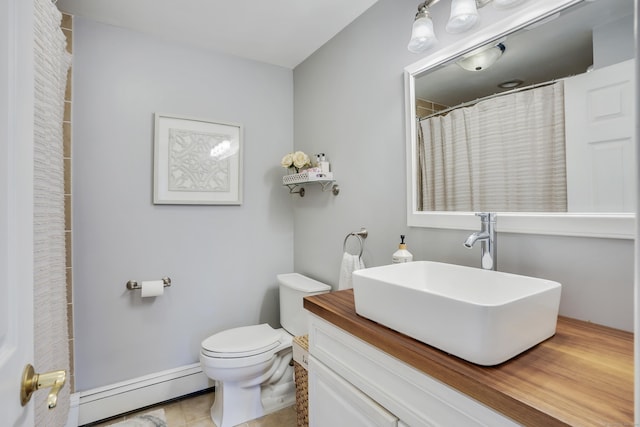 bathroom featuring a shower with curtain, vanity, baseboard heating, tile patterned flooring, and toilet