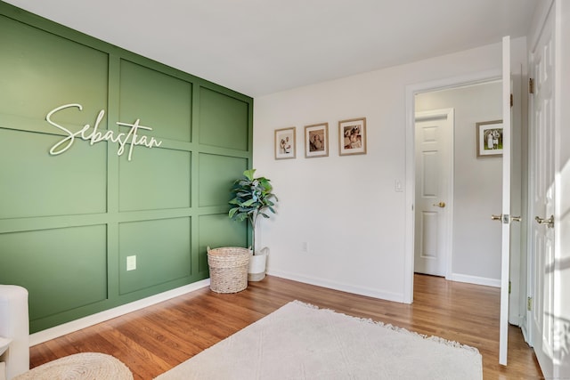 living area with wood-type flooring