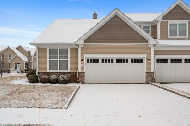 craftsman-style house with a garage