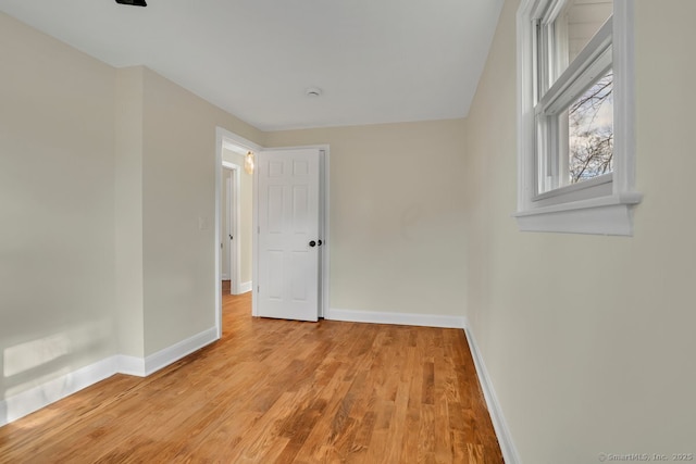 unfurnished room featuring light hardwood / wood-style floors