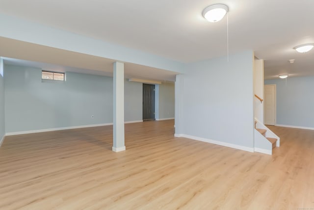 basement featuring light hardwood / wood-style flooring