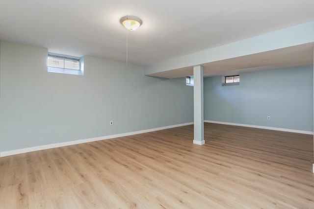 basement featuring light hardwood / wood-style floors