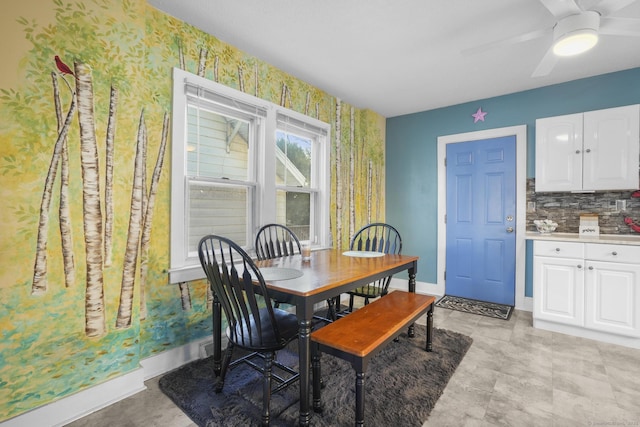 dining room with ceiling fan