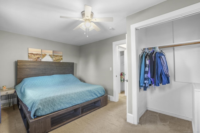 bedroom featuring carpet, a closet, and ceiling fan