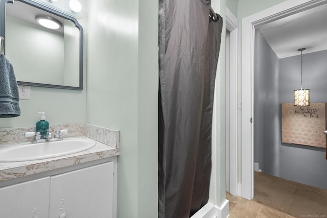 bathroom featuring tile patterned floors and vanity