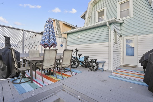 wooden deck featuring grilling area