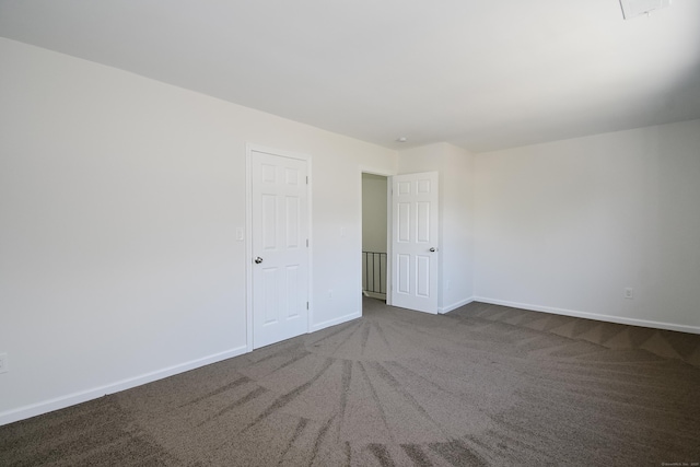 empty room featuring carpet