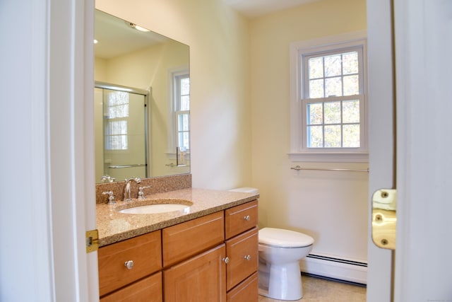 bathroom featuring a shower with shower door, toilet, vanity, and baseboard heating