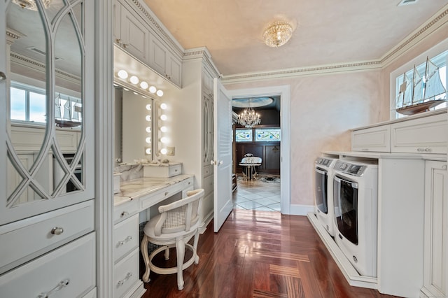 interior space featuring washing machine and clothes dryer, an inviting chandelier, ornamental molding, built in study area, and baseboards