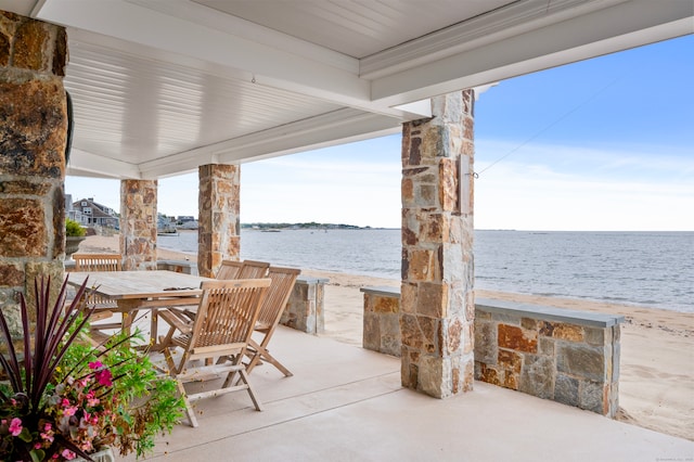 view of patio / terrace featuring a water view