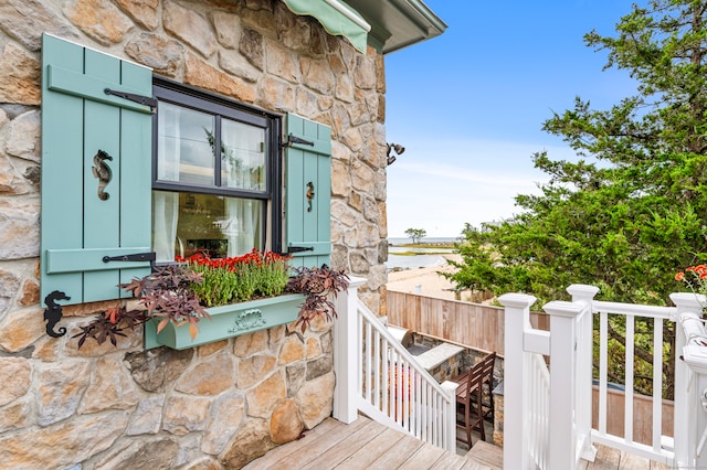 view of exterior entry with stone siding