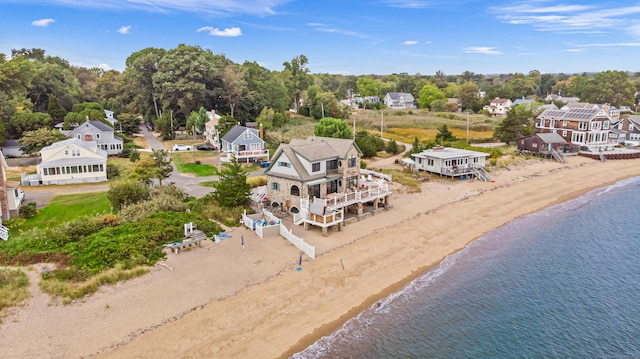 aerial view featuring a water view and a view of the beach