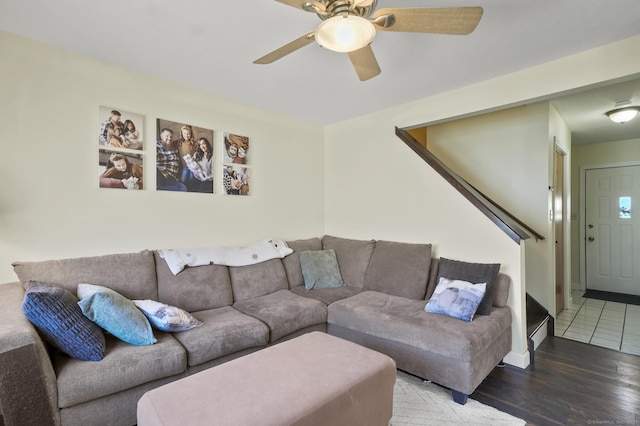 living room with ceiling fan and wood-type flooring