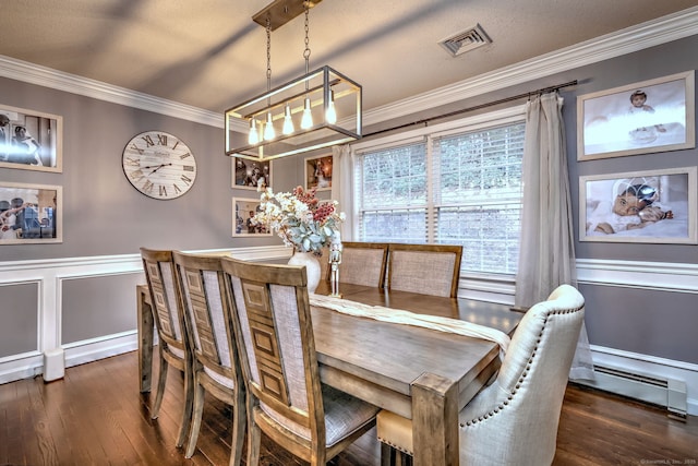 dining space featuring a chandelier, dark wood-type flooring, baseboard heating, and ornamental molding