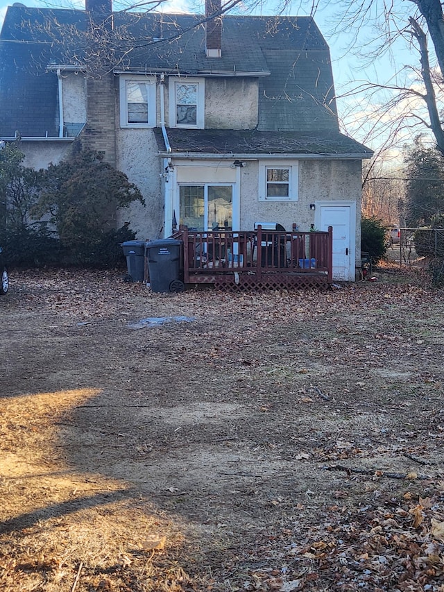 rear view of house with a deck