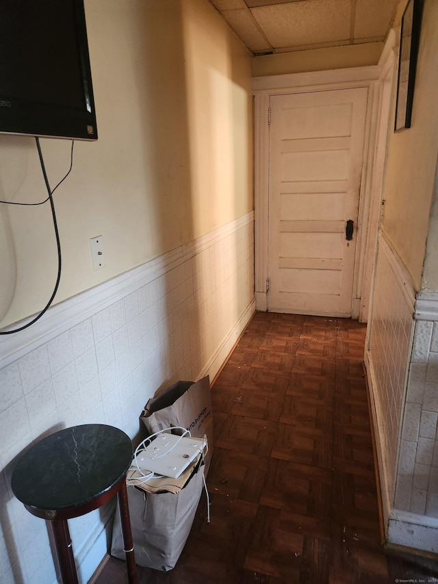 hall with dark parquet floors