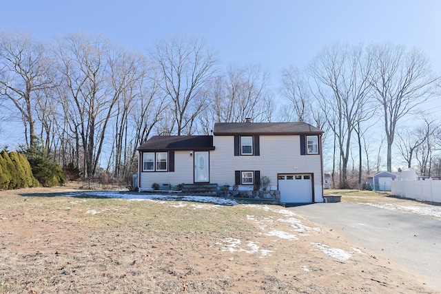 tri-level home featuring a garage