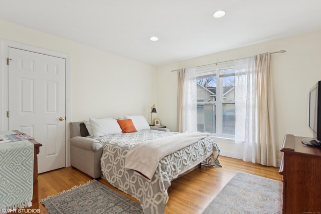 bedroom with light hardwood / wood-style flooring