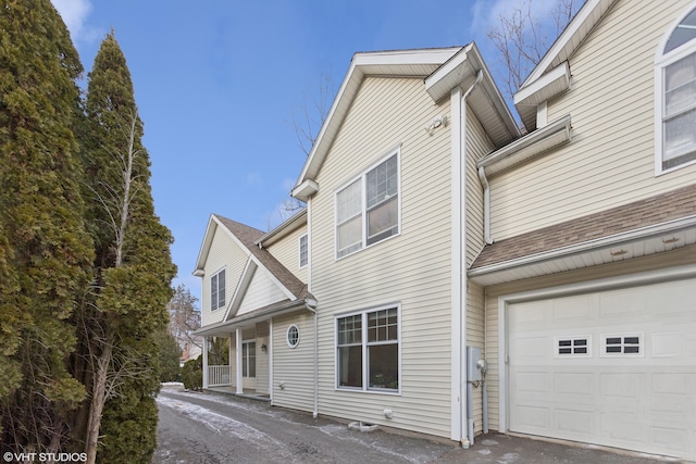 exterior space featuring a garage