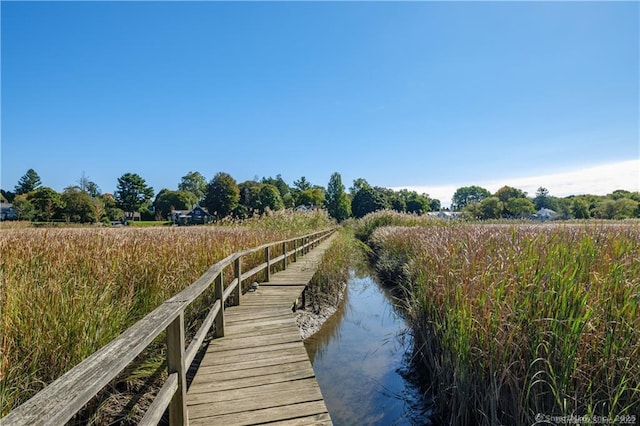 dock area featuring a rural view and a water view