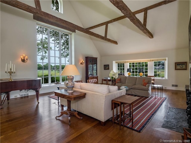 living room with beam ceiling, dark hardwood / wood-style flooring, and high vaulted ceiling