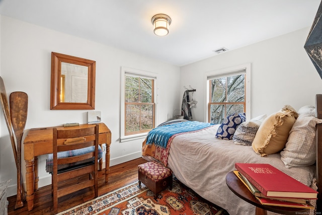 bedroom featuring hardwood / wood-style floors