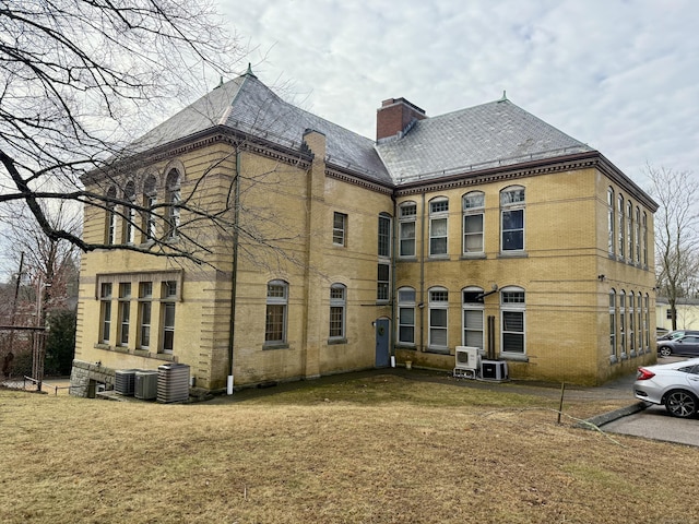 exterior space featuring central AC unit