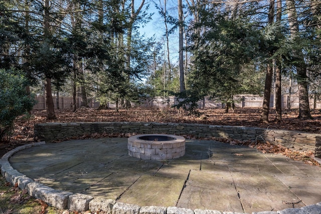 view of patio / terrace with an outdoor fire pit