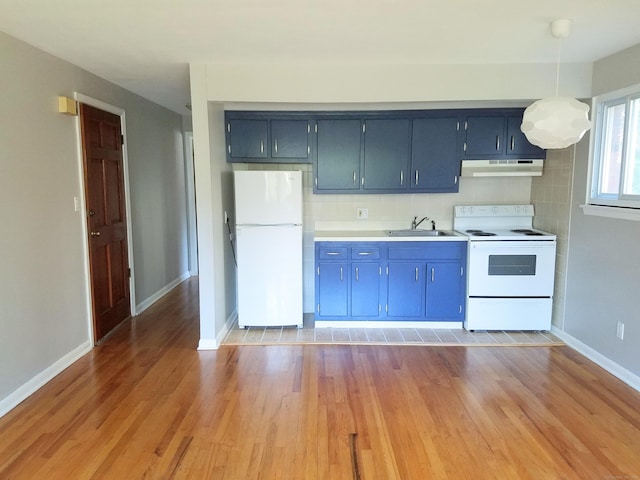 kitchen with sink, decorative light fixtures, white appliances, light hardwood / wood-style floors, and decorative backsplash