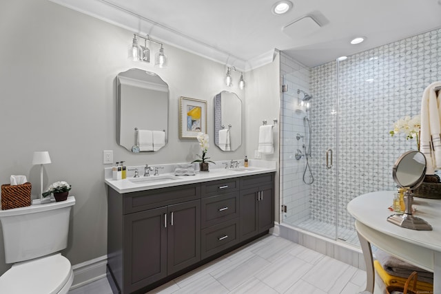 bathroom featuring an enclosed shower, vanity, crown molding, tile patterned flooring, and toilet