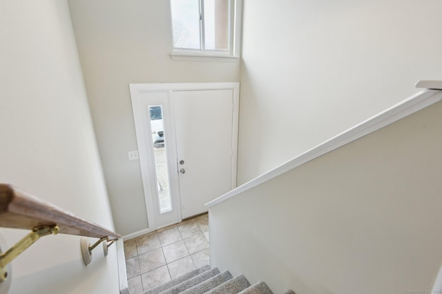 entrance foyer with light tile patterned flooring