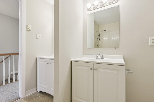 bathroom with vanity and tile patterned floors