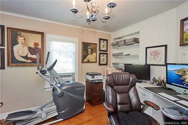 home office featuring cooling unit, ornamental molding, a notable chandelier, and light wood-type flooring