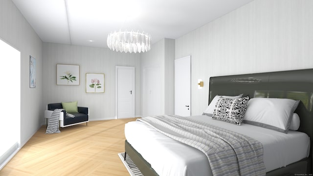 bedroom featuring a chandelier and baseboards