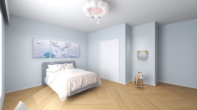 bedroom with light parquet flooring