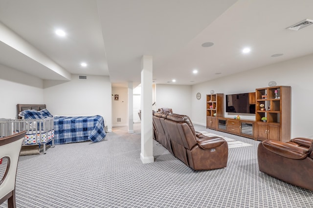 carpeted living room featuring recessed lighting, visible vents, and baseboards