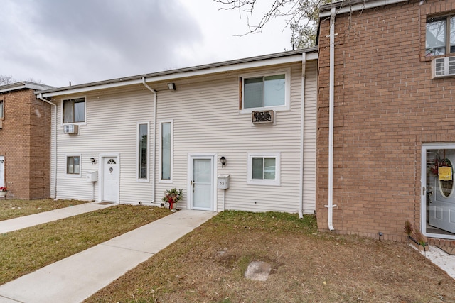 view of front of home with a front yard