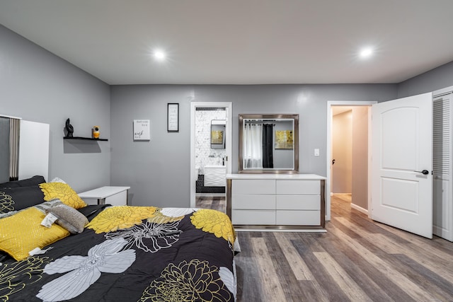 bedroom with dark wood-type flooring