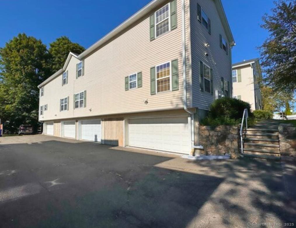 view of home's exterior with a garage