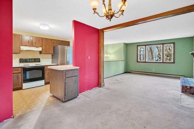 kitchen featuring white range with electric stovetop, a baseboard heating unit, hanging light fixtures, stainless steel fridge, and a notable chandelier